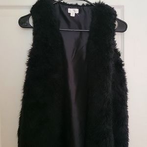 Black faux fur vest